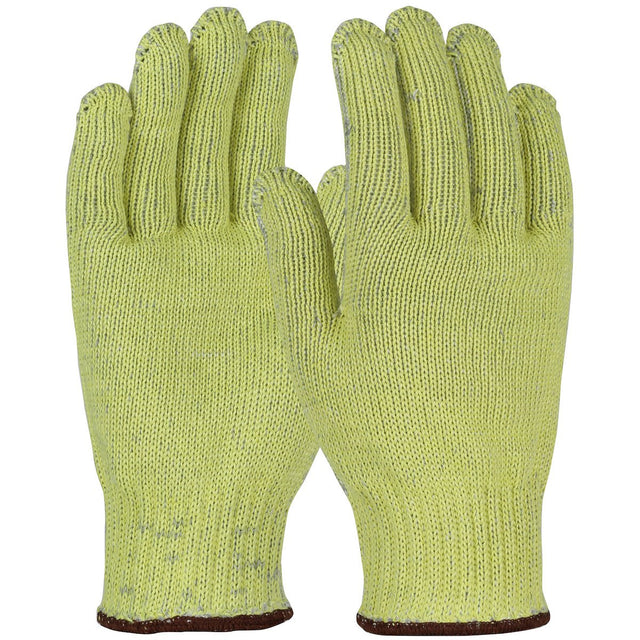 A pair of PIP Kut Gard A7 seamless knit gloves with a yellow design and brown-trimmed cuffs, offering cut resistance for improved safety, displayed upright and facing the viewer.