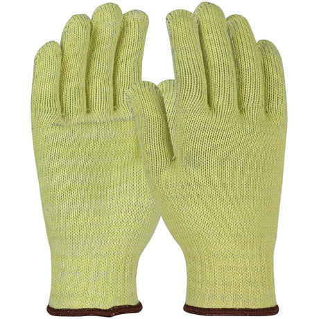 A pair of PIP Kut Gard A9 Seamless Knit ATA MATA503 yellow gloves, featuring a ribbed texture and brown wrist trim, designed for cut resistance in metal fabrication environments, displayed on a white background.