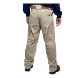 A person wearing GRIT FR Cargo Pants by GRIT FR Workwear, featuring multiple pockets and a brown belt, stands with their back to the camera. Their dark shoes provide a contrast against the plain white backdrop, subtly showcasing CAT2 protection.