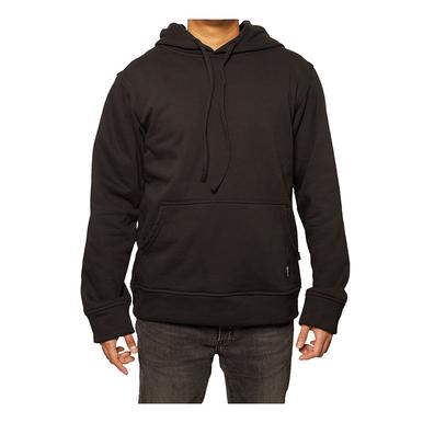 A person wearing the GRIT FR Pullover Hoodie from GRIT FR Workwear, featuring flame-resistant material, a front pocket, and drawstrings, stands against a plain white background. Paired with dark jeans, this electrical work apparel includes long sleeves and offers a relaxed fit.