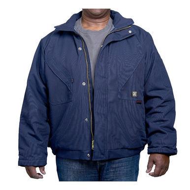 A person wearing a navy blue GRIT FR Insulated Field Jacket from GRIT FR Workwear over a gray shirt and blue jeans, with their hands at their sides. The jacket includes quilt-lined insulation, a zipper and button closure, with a visible logo on the front. The background is plain white.