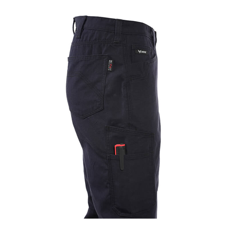 The NSA DRIFIRE Range Flex Pro Relaxed FR Work Pant in navy is displayed from the side, highlighting its multiple pockets—one with a red and black pen clipped inside. These arc-rated safety pants feature reinforced stitching, a relaxed fit for lasting comfort during long shifts, and a visible label near the waistband.