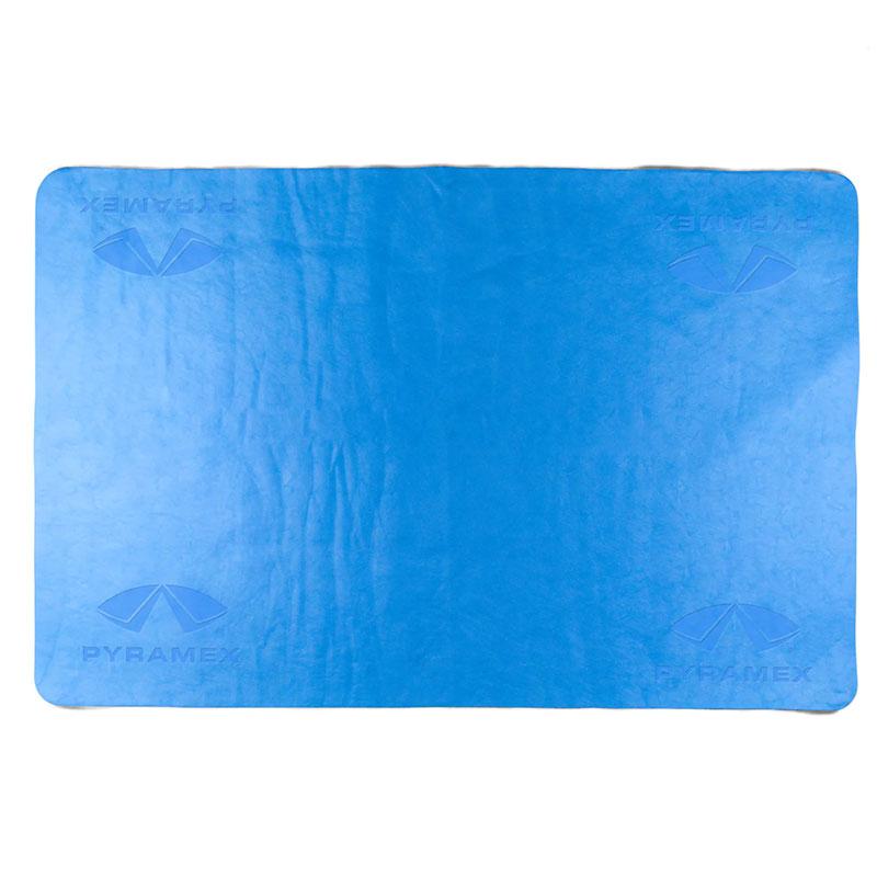 A blue rectangular anti-fog lens cleaning cloth, made from anti-microbial, evaporative PVA material, prominently displays the "PYRAMEX" label along with a corner logo. Designed for repeated use to ensure enduring clarity and protection.