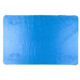 A blue rectangular anti-fog lens cleaning cloth, made from anti-microbial, evaporative PVA material, prominently displays the "PYRAMEX" label along with a corner logo. Designed for repeated use to ensure enduring clarity and protection.