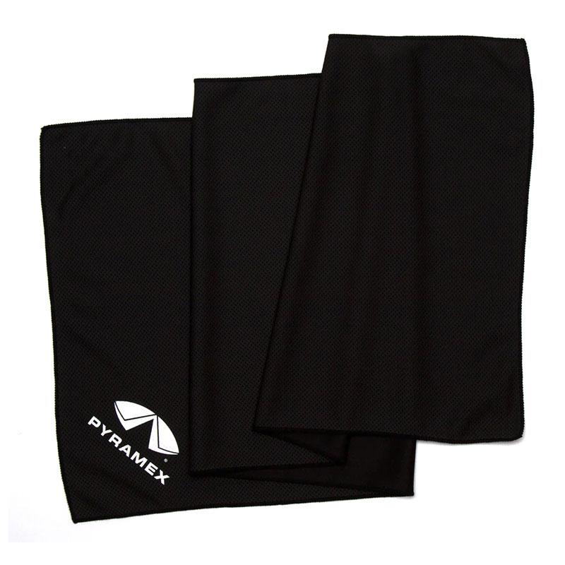 A folded black cooling towel from the Pyramex C3 Series, branded with a geometric design and "PYRAMEX" text in one corner. The textured fabric of Pyramex Safety's towel offers cooling relief and UPF 50+ protection, all set against a plain white backdrop.