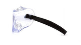 The Pyramex G205 Series Chemical Splash Goggles, available in a box of 12, are displayed from a side perspective featuring a transparent, scratch-resistant shield that effectively covers the eyes. These safety goggles by Pyramex Safety come equipped with clear lenses and an adjustable black strap, offering anti-fog protection to ensure optimal visibility and safety across diverse environments.