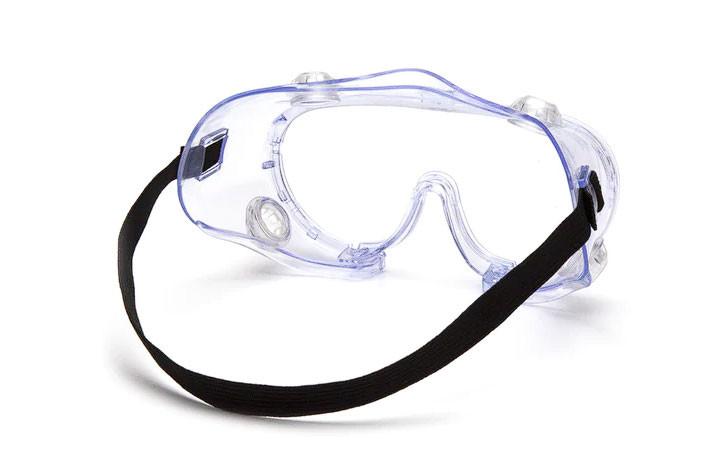 The Pyramex Safety G205 Series Chemical Splash Goggles include clear lenses with anti-fog properties and a black adjustable strap, ensuring clear vision during intense tasks. These goggles are specifically designed for chemical splash protection and feature scratch-resistant lenses for increased durability and safety in demanding environments.