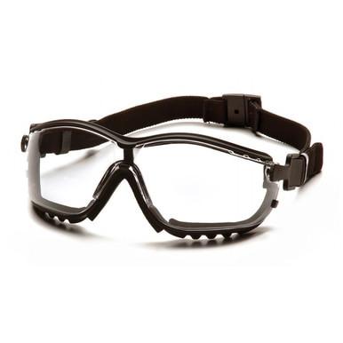 The Pyramex V2G Goggles GB18_0ST from Pyramex Safety are designed for protective use, featuring clear lenses and an adjustable strap in a black frame. These goggles include a durable structure with ventilation openings along the edges and provide UV protection for enhanced safety.