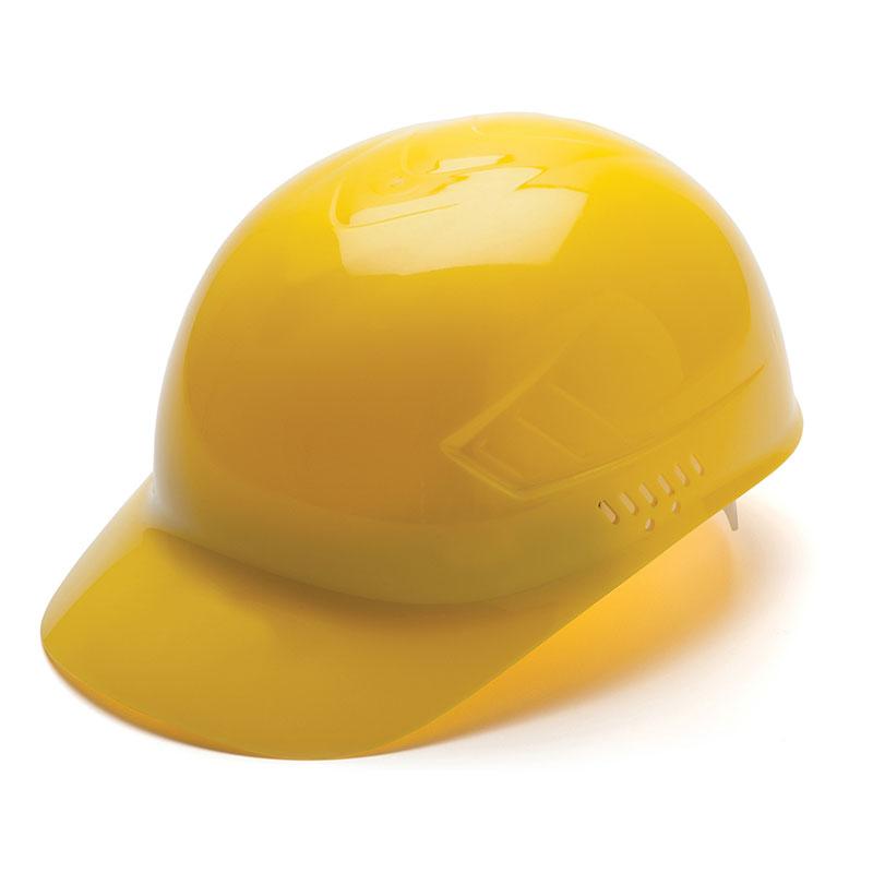 The Pyramex Safety Ridgeline Bump Cap 4 Pt Ratchet Hard Hat, in a vibrant yellow with a glossy finish, features ventilation holes on the sides for enhanced comfort and a 4-point glide suspension system to ensure optimal fit, providing dependable protection against scalp lacerations. It is presented against a pristine white backdrop.