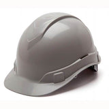 The Pyramex Safety Ridgeline Cap Style 4 Pt Ratchet Hard Hat, featuring a low-profile design, provides lightweight protection and is ideal for construction or industrial settings. This gray safety helmet is showcased against a plain white background.