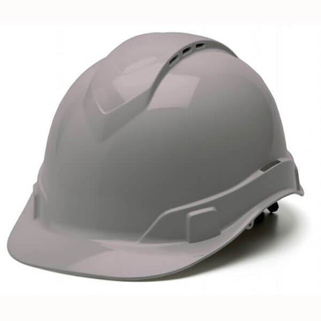 The Pyramex Safety Ridgeline Vented Cap Style Hard Hat, a gray helmet known for its ultra-light protection, features a smooth and contoured design with a front brim. It includes ventilation slots for airflow and an adjustable strap at the back for a secure fit, shown against a plain background.