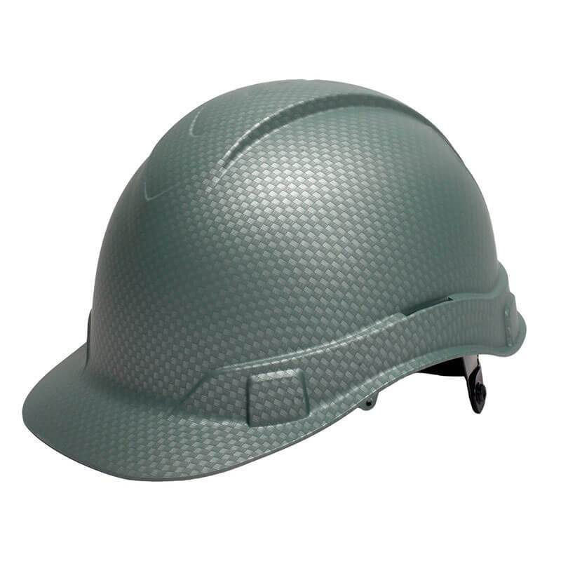 A Pyramex Safety Ridgeline Cap Style hard hat with a gray, carbon-fiber-like textured pattern and a low profile design. This Pyramex Hydro Dipped model includes a short brim, an adjustable rear strap, and 4-position harness points, all set against a plain white background.