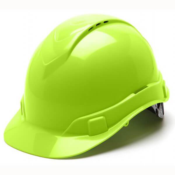 The Pyramex Safety Ridgeline Vented Cap Style 4-Point Ratchet Hard Hat, known for its ultra-lightweight design, stands out with a bright green finish and smooth, glossy surface. Its curved brim and vented crown are evident from the side view, ensuring optimal airflow.