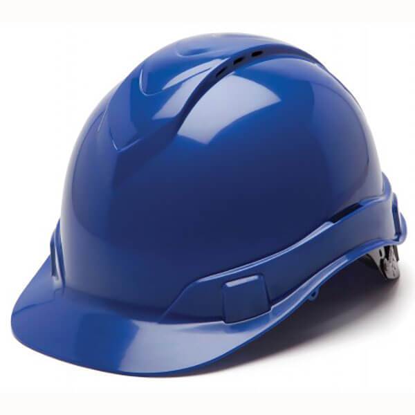 A blue Pyramex Safety Ridgeline Vented Cap Style 4Pt Ratchet Hard Hat, boasting a glossy finish and ultra-light protective features such as a curved bill and ventilation slots. The helmet is angled to highlight its side and front contours.