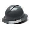 The Pyramex Safety Ridgeline Full Brim Hard Hat, equipped with a ratchet suspension, is beautifully displayed on a white surface. Its full brim design accentuates the light reflecting off its sleek gray surface.