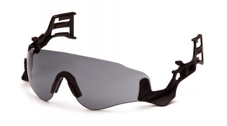 Introducing the Pyramex Safety Ridgeline Lens Accessory, featuring a sleek black design with dark, wraparound lenses and adjustable side extensions. These sunglasses boast a modern, angular look with UV-resistant lenses and padded nose grips for added comfort, making them perfect for individuals seeking both style and dependable eye protection.