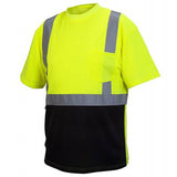 The Pyramex Safety RTS21B Series Hi-Vis - Black Bottom T-Shirt is a moisture-wicking, lightweight polyester short-sleeve shirt designed for enhanced visibility. It features a bright yellow top with a black bottom and includes reflective gray strips across the chest, shoulders, and torso. This shirt also has a left-side chest pocket and meets ANSI/ISEA 107-2015 Type R Class 2 standards.