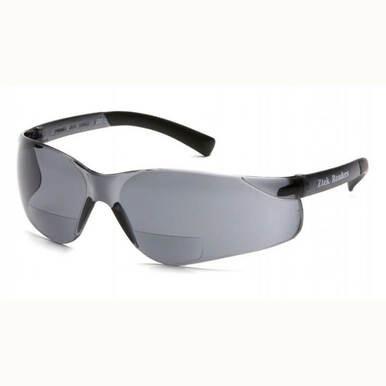 The Pyramex Ztek Reader Safety Glasses S25_0R by Pyramex Safety feature a sporty and modern design with sleek wraparound frames. These glasses come with dark tinted lenses and black frames, offering scratch resistance and full UVA/B/C protection for enhanced safety.