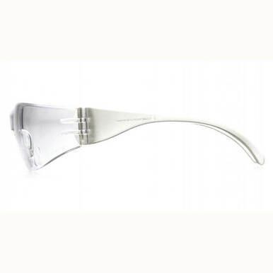 A side view of Pyramex Safety's Pyramex Intruder Reader Safety Glasses S4110R reveals transparent, futuristic styling. These eyewear pieces feature Clear Reader Lenses with sleek, curved arms and a minimalist design. Both the scratch-resistant lenses and frame are clear, providing UVA/B/C protection for a modern and distinctive look.