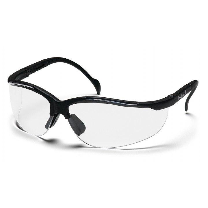 Introducing the Pyramex Venture II Safety Glasses, a set of clear safety glasses featuring a sleek black frame with adjustable nose pads. Engineered for optimal eye protection, these wraparound lenses provide essential UV protection, ensuring comprehensive safety across various environments. Available in boxes of 12 from Pyramex Safety.