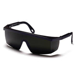 A pair of Pyramex Integra Welding Shade Safety Glasses by Pyramex Safety, with sleek dark-tinted lenses and a modern angular design featuring thick frames, resemble stylish protective eyewear. The straight top bar and wraparound style allow these safety glasses to rest elegantly on a white surface.