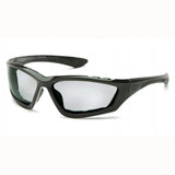 A set of stylish Pyramex Safety black safety glasses, featuring wraparound frames and dark lenses with UVA/B/C protection, displayed against a plain white background.