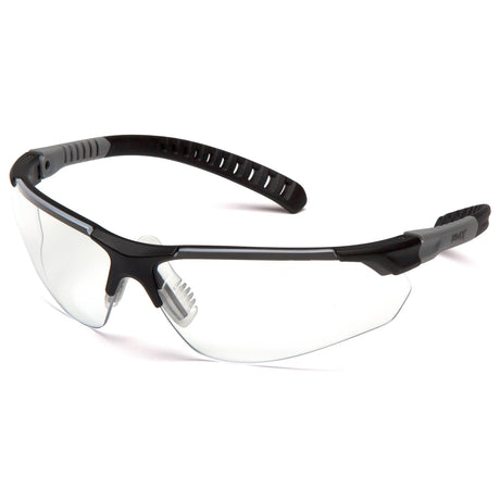 The Pyramex Sitecore Safety Glasses SBG101_0DTM, from Pyramex Safety, are ideal for industrial applications with their clear lenses and black frames. They come equipped with adjustable nose pads for added comfort. The arms have a textured grip to ensure they fit securely, and the anti-fog coating keeps your vision clear. Displayed on a white background, these glasses provide both style and practicality.