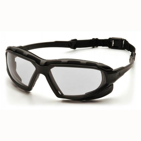 The Pyramex Highlander Plus H2X Anti-Fog Safety Glasses by Pyramex Safety feature scratch-resistant polycarbonate lenses with clear UVA/B/C protection. Designed with an adjustable strap and a rugged build, these black goggles are ideal for outdoor or sports activities, all set against a neutral background. Available in a box of 12.