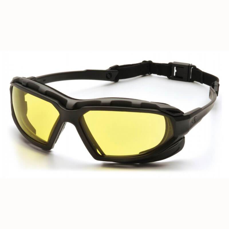 The Pyramex Highlander Plus H2X Anti-Fog Safety Glasses by Pyramex Safety are designed for outdoor activities. These black sports goggles feature sturdy frames, adjustable straps for a secure and comfortable fit, and yellow-tinted, scratch-resistant polycarbonate lenses.