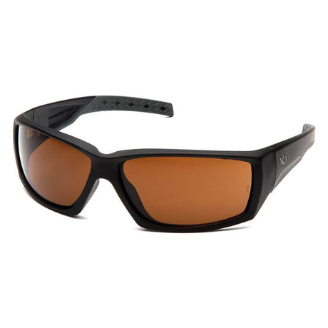 These Pyramex Venture Gear Overwatch Tactical Glasses feature a black rectangular frame with orange-tinted, anti-fog lenses. Manufactured by Pyramex Safety, the design includes textured arms with a small logo near the hinge and provides complete UVA, UVB, and UVC protection.