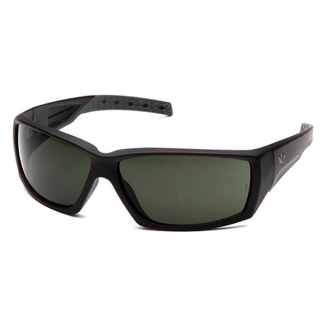 The Pyramex Safety Venture Gear Overwatch Tactical Glasses in black offer a sleek and modern sporty design. They come with dark tinted, anti-fog lenses and a textured pattern on the inner arms, providing full UVA, UVB, and UVC protection.