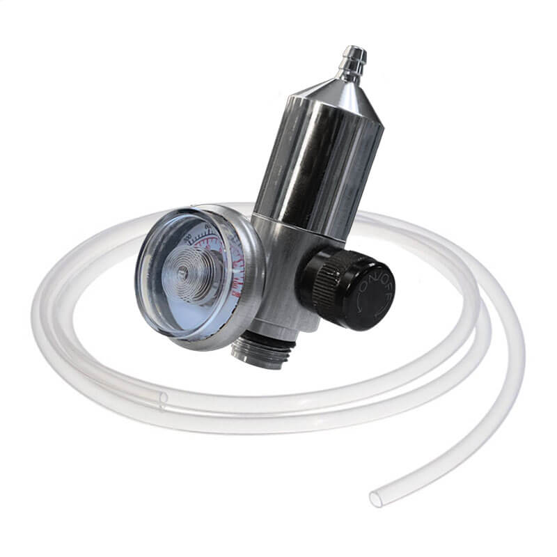 The ISG Fixed Flow Regulator (0.25 LPM) w/Tubing by Intermountain Specialty Gases is a metallic CO2 regulator with a pressure gauge and black knob, featuring a C-10 valve and attached to clear flexible plastic tubing—ideal for use with disposable gas cylinders.