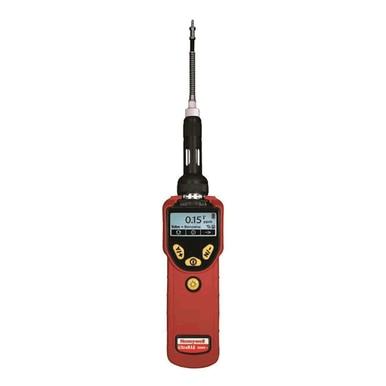 The RAE Systems UltraRAE 3000+ is equipped with a digital torque wrench featuring a red handle and black grip. This tool includes a display screen for showing torque measurements, buttons for adjustment, and a long metal stem terminating in a socket. It provides high sensitivity in its dual detection mode, ensuring precise torque control.