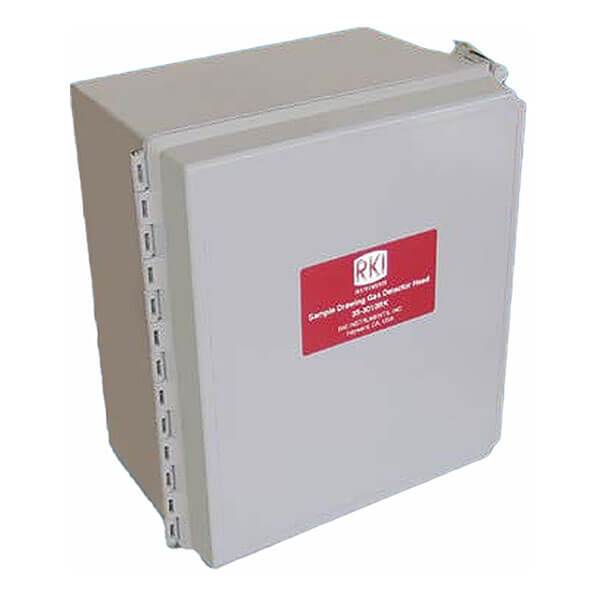 Image of a gray RKI Instruments NEMA 4X enclosure box with a red "RKI" label on the front. The RKI 35-3010RK Multi-Gas Sample Draw Detector Assembly features a hinged door with a latch on the right side, making it ideal for housing electronic components or multi-gas detectors.