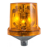 An RKI Instruments RKI Rotating Alarm Light, intended for non-hazardous locations, is equipped with an amber warning light encased in a transparent cover on a metallic base. It is activated and emits a warm yellow glow.