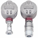 Two metallic cylindrical RKI Direct Connect Gas Sensors, labeled "Adalet," each with a large round top. The left sensor has a conical extension, while the right sensor has a wider, shorter one. Both feature red labels and industrial design elements typical of explosion-proof equipment from RKI Instruments.