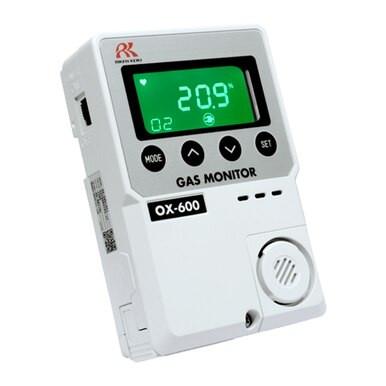 The RKI Instruments OX-600 Indoor Stand Alone Oxygen Monitor, model 72-100_, in white, is equipped with a galvanic cell sensor and a digital display showing "20.9". It features buttons labeled "Mode," "Enter," and "Set," as well as a small speaker grille, making it ideal for monitoring oxygen levels indoors.