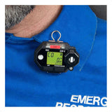 A close-up of a person in a blue uniform with an "Emergency Response" logo shows the RKI Instruments GasWatch 3 CO Gas Personal Monitor 73-0023 clipped to the uniform. Its IP-66/68 rated design features a yellow screen displaying "CO 0 ppm," indicating safe carbon monoxide levels.