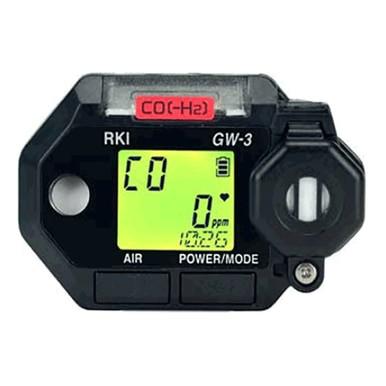 The RKI Instruments GasWatch 3 CO (-H2) Single Gas Monitor, model 73-0025, showcases "CO" with a reading of "0 ppm" on a bright green screen. It features the RKI Instruments label and includes buttons for "Air" and "Power/Mode." A small, circular hydrogen compensated sensor is positioned on the right side.