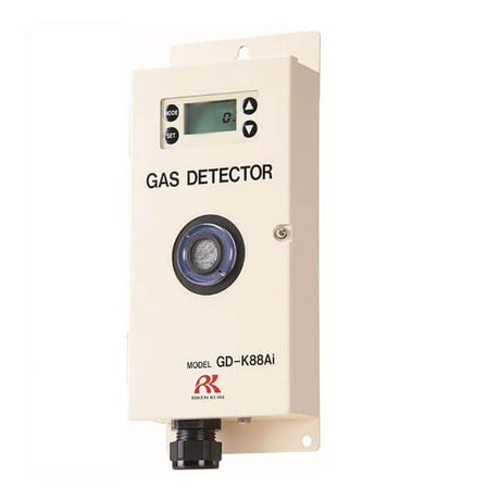 The RKI Instruments GD-K88AI diffusion sensor/transmitter for hydrogen sulfide detection is a wall-mounted device with a digital display and button controls. It includes a central cylindrical diffusion transmitter for precise measurements. Designed with intrinsic safety, this sleek rectangular unit is white and marked with the RKI brand, ensuring dependable performance.