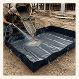A construction worker directs wet concrete from a truck into an UltraTech Concrete Washout Berms - RPE Model by UltraTech, a reinforced polyethylene rectangular berm set on dirt at a construction site for safe slurry containment.