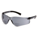 The Pyramex Ztek Reader Safety Glasses S25_0R by Pyramex Safety feature a sporty and modern design with sleek wraparound frames. These glasses come with dark tinted lenses and black frames, offering scratch resistance and full UVA/B/C protection for enhanced safety.