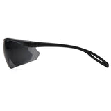Side view of Pyramex Neshoba H2Max Anti-Fog Safety Glasses by Pyramex Safety, featuring a lightweight black wraparound design, single dark polycarbonate lens, and sleek curved arms with small cutouts near the ends.