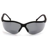 A pair of Pyramex Venture II V2 Reader Safety Glasses by Pyramex Safety, featuring black wraparound frames and dark tinted magnified lenses, is shown from the front against a white background.