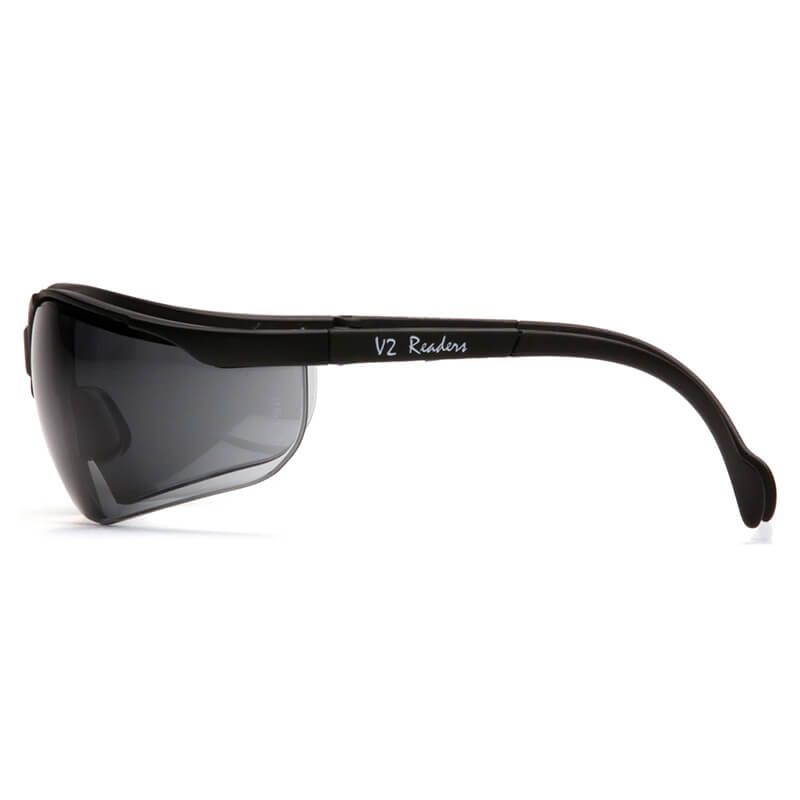 Side view of Pyramex Venture II V2 Reader Safety Glasses with wraparound dark-tinted lenses and thick arms. The arm displays "V2 Readers" in white text. Brand: Pyramex Safety. Packed 6 per box.