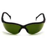 A front view of Pyramex Venture II Welding Safety Glasses SB18_0SF by Pyramex Safety, featuring black frames, curved dark green lenses with UV protection, displayed on a white background.