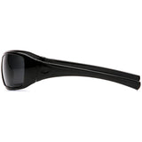 Side view of Pyramex Safety Goliath Safety Glasses (12/box) with black wraparound thick frames and dark lenses, providing stylish eye protection against a white background.