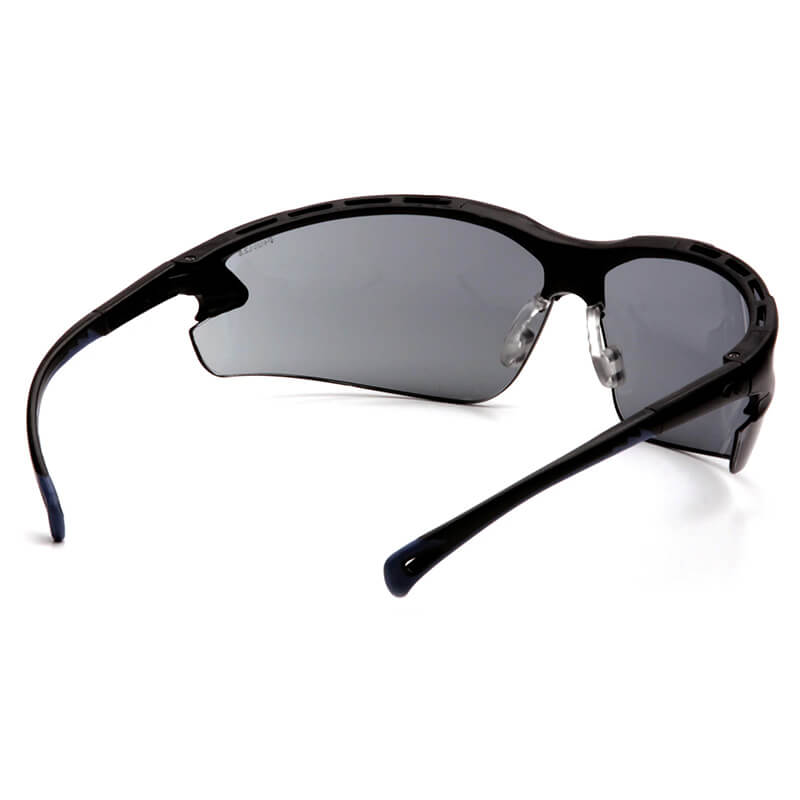 Pyramex Venture 3 Safety Glasses SB57 by Pyramex Safety feature a sleek black wraparound frame, dark tinted lenses for UV protection, and are shown from a rear angled view. Each box contains 12 pairs.