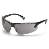 Featuring a sleek, black design, the Pyramex Venture 3 Safety Glasses SB57 by Pyramex Safety come with wraparound dark-tinted lenses and UV protection. Their slightly curved, aerodynamic frame adds to the stylish look, and the slim, ergonomic temples ensure a secure fit during active use. Available in boxes of 12.