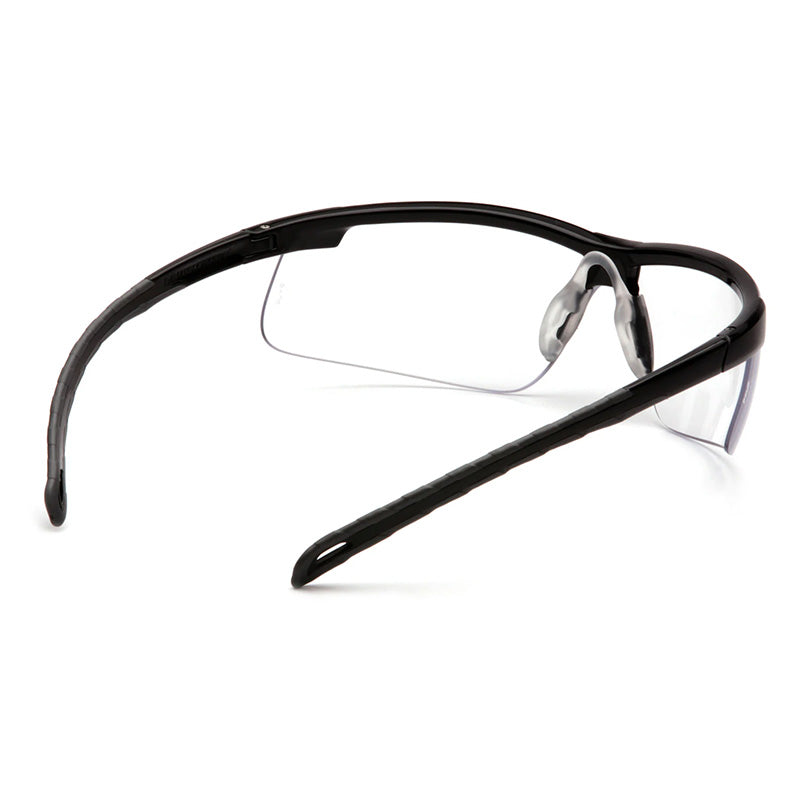 Pyramex Safety Ever-lite Anti-fog Safety Glasses SB86_ _DT feature black frames, clear lenses, impact protection, curved textured arms, and soft nose pads; shown from a rear side angle on a white background. Box of 12.